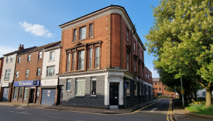 Front elevation of the Grade II listed former bank at Church Square in Oldbury, retained as part of the Lapworth Architects conversion to a high quality HMO
