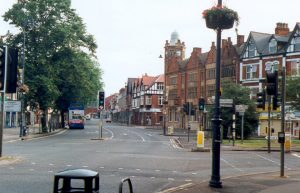 Street scene in Moseley, Birmingham, showing the traditional architecture and commercial frontage near Anderton Park Road, providing local context for Lapworth Architects’ residential design.