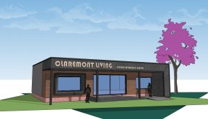 Exterior view of the Claremont Citizen Experience Centre in Birmingham, designed by Lapworth Architects in collaboration with Claremont and Birmingham City Council. The single-storey timber and brick building provides an inclusive, accessible environment for assisted-living demonstrations.
