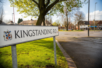 Street sign for Kingstanding Road in Birmingham with surrounding houses and local shops, showing the context for Lapworth Architects’ residential scheme at 623 Kingstanding Road.